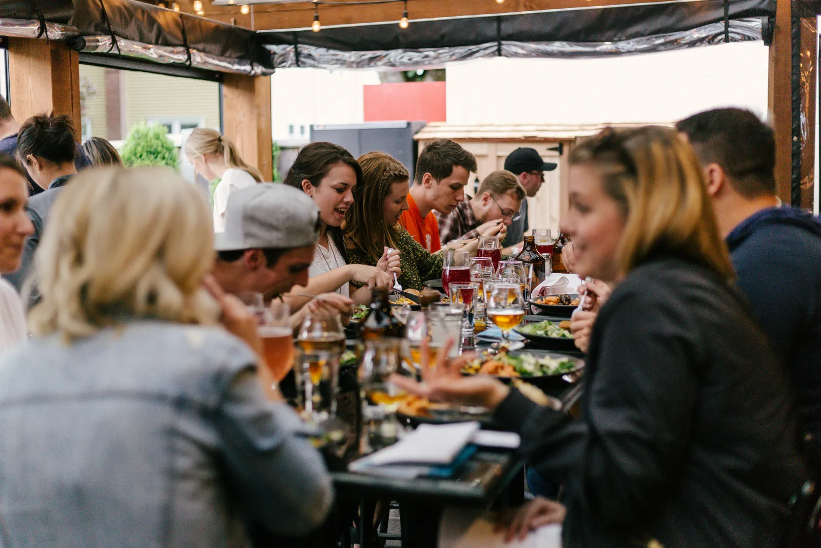 Guests enjoying a warm meal together at Test A